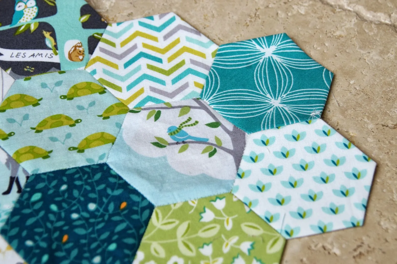 More hexies, using Les Amis and Backyard Baby scraps. Not sure what this will be, I just got on a hexie roll and thought these made nice fussy cut little blocks.