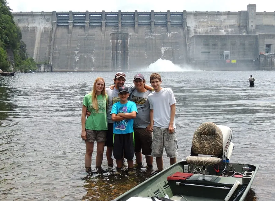 In front of Center Hill Dam, pre-sunburn (look at those white legs!)