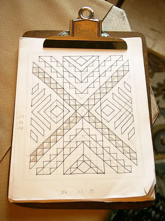 Then once I'm happy with the pencil rough, I go over it with a black pen (this is a different design).