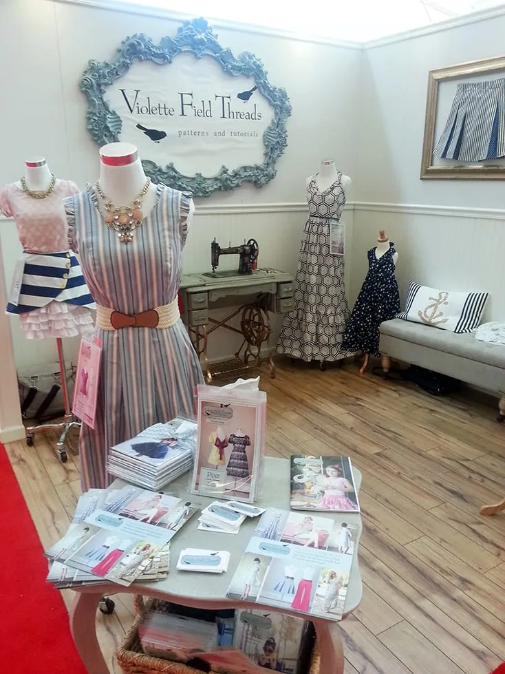 It’s the yellow shirt with the purple bow on the back, right in the middle of the display table. eek! Definitely wanting to try out some of their patterns, especially the pleated pants.